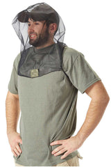 Side view of man wearing insect protective headset